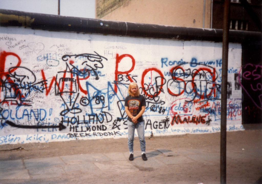 A summary of the 1980s in one photograph: Tom at the Berlin Wall in 1989